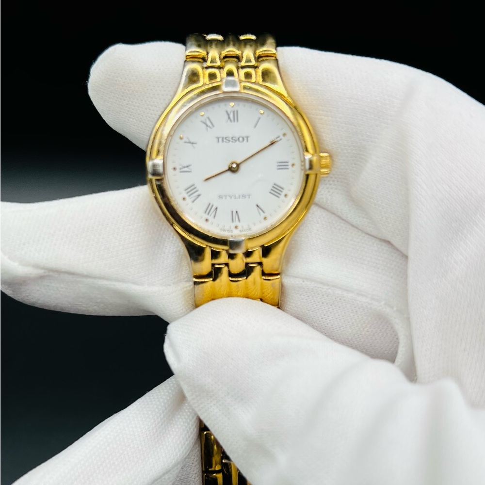 Tissot Gold Watch with White Dial